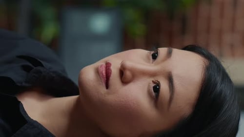 Close Up of Woman Lying Down Indoors