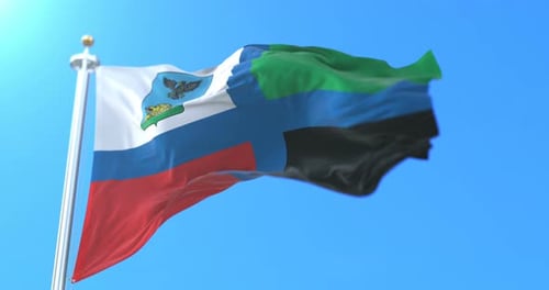 Realistic Flag Waving with Regional Emblem in Blue Sky