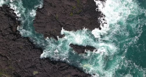 Drone over Snaefellsnes lava formations and Atlantic Ocean waves, Iceland
