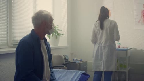 Old Man Waiting Medical Examination in Clinic Close Up