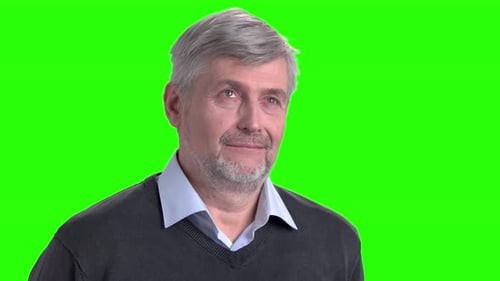 Smiling Mature Man on Green Screen.