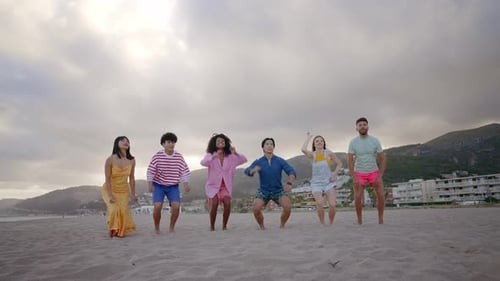 Group of friends having fun on the beach.
