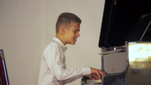 Teen Plays Piano and Sings with Passion