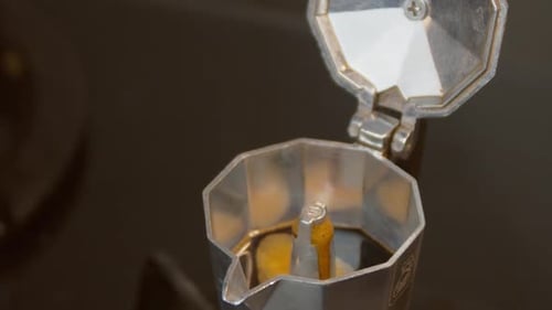 Moka Pot Brewing Coffee on the Stovetop