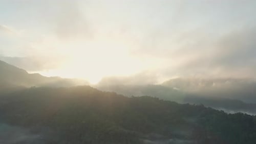 Mountains and Valleys Shrouded in Morning Mist