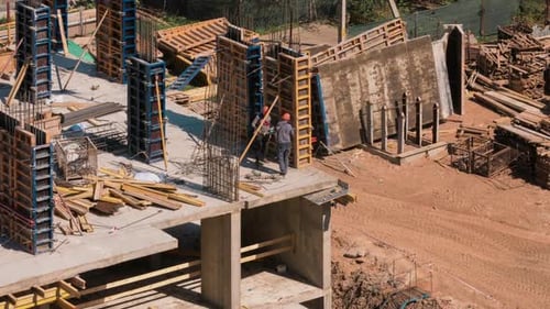 Constructors Working at Construction Site Residential Building Work with Steel Rebar Structures