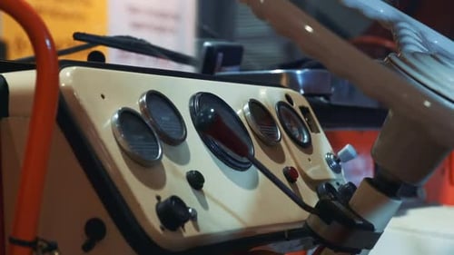 Close-up of Retro Car Dashboard and Steering Wheel in Milk Color