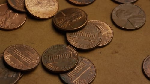 Rotating stock footage shot of American pennies (coin - $0.01) - MONEY 0172