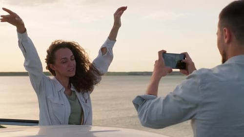 Taking Photos Of Beautiful Woman
