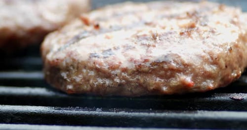 Homemade Meat Burger Is Grilled with Smoke.