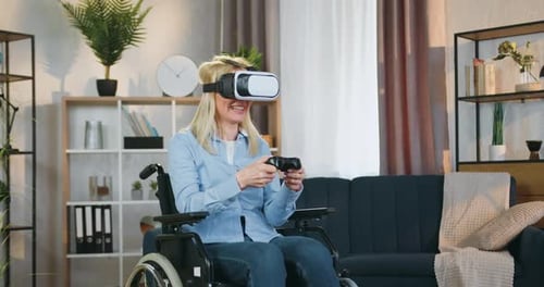 Woman in Wheelchair Enjoying Virtual Reality Gaming