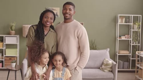 Loving Family Posing Together in Living Room