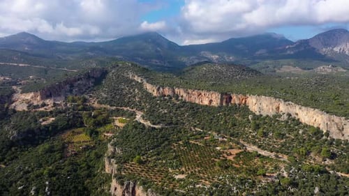 Aerial View of Rocky Cliffs and Mountainous Landscape