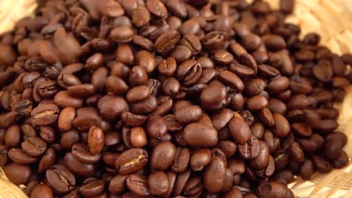 Coffee Beans Pouring Into Basket