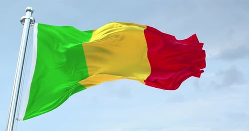 Waving Mali Flag Against Blue Sky