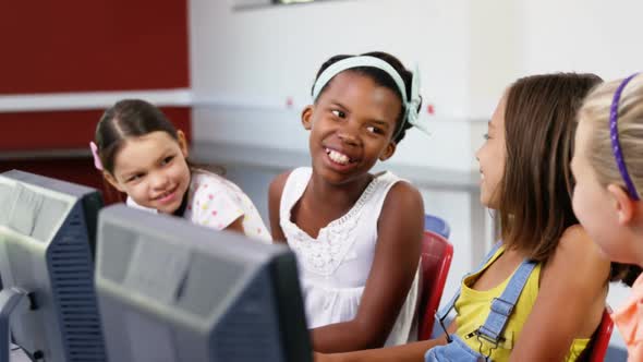 Four Happy Girls Learning on Computers Together, Education Stock ...