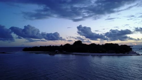 Tropical flying island view of a paradise sunny white sand beach and aqua blue ocean background in h