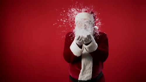 Santa Claus Blowing Snow off His Palms