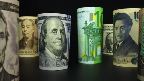 Foreign currency money exchange concept. Many banknotes of different nations.