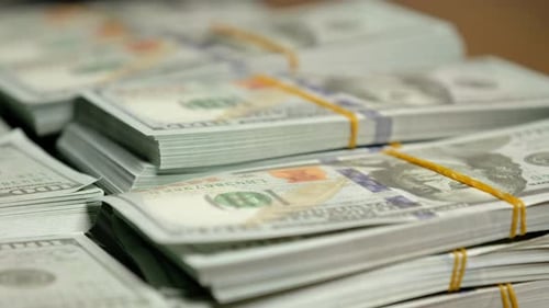 Stacks of US Currency Hundred Dollar Bills