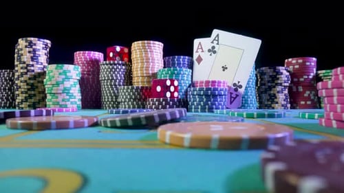 Set of Colorful Chips Playing Cards and Red Dice on a Gaming Table for Gambling in a Casino
