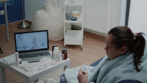 Woman Telemedicine Call with Doctor at Home