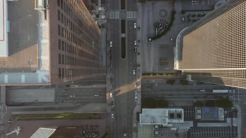 AERIAL: Breathtaking Overhead Birds Eye View of Downtown Los Angeles California in Beautiful Sunset