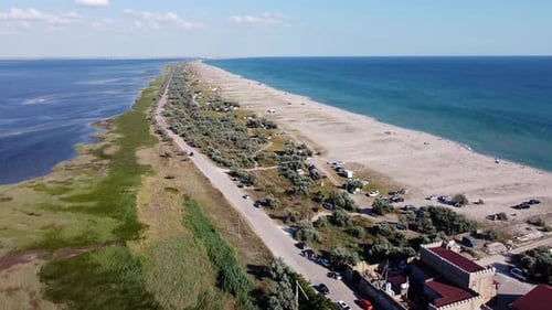 A Beautiful Bird'seye View of the Sand Spit the Shore on One Sidethe Sea on the Other a Fresh Lake
