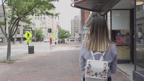 Empty streets with woman walking lonely during corona virus pandemic, Portland