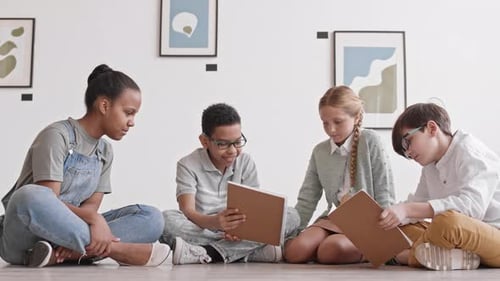 Children Studying on Floor of Museum