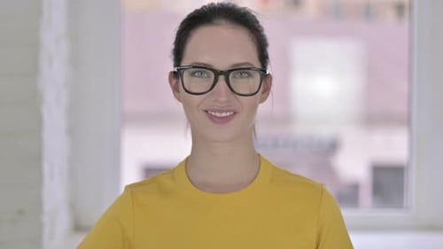 Young Adult Woman Gives Thumbs Up