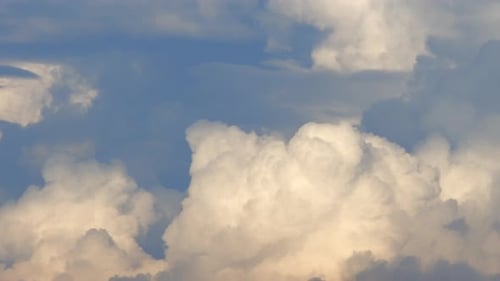 Fluffy cloud time lapse on a cloudy day 4k footage.