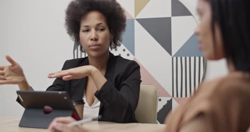 Business Meeting with Two Women in Office
