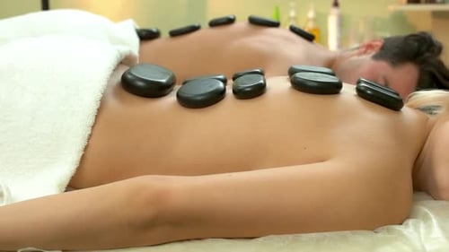 Couple Relaxing with Hot Stone Massage