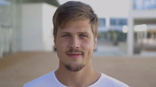 Smiling Man in an Urban Environment Close Up
