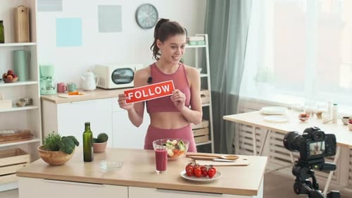 Female Blogger Vlogging About Healthy Food in Kitchen