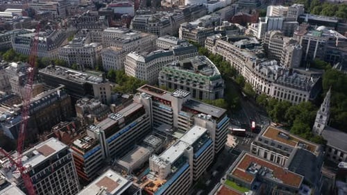 Backwards Fly Above Buildings Around Strand Street
