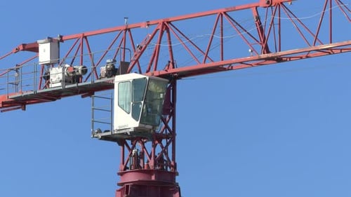 Tower crane cabin close-up working on a construction site