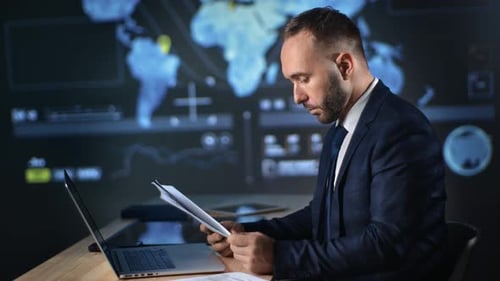 Business Male Analyze Paper Document Tax Payment Letter Partnership Contract at Hi Tech Office