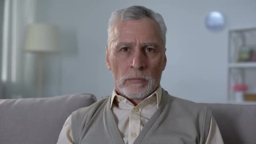 Portrait of Sad Elderly Man Feeling Lonely and Helpless, Retirement Insecurity