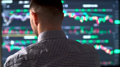 Businessmen Trading Stocks Online Working with Graphs Indexes and Numbers