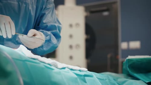 Surgeon using medical scissors during an operation