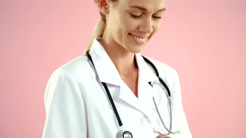 Female Doctor Using Tablet Device in Hospital