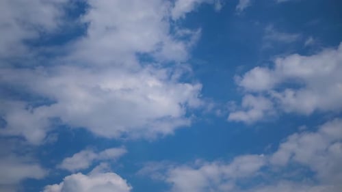Time Lapse of White Clouds Moving Across Sky