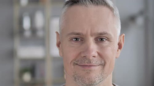 Yes, Face Close Up of Gray Hair Man Shaking Head To Accept Offer