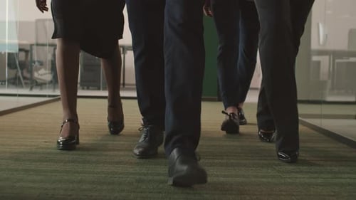 Group of Business People Going along Office