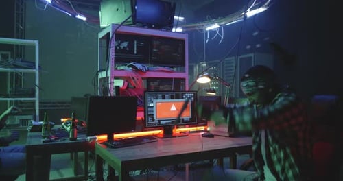 Hacker Destroying Keyboard in His Anger