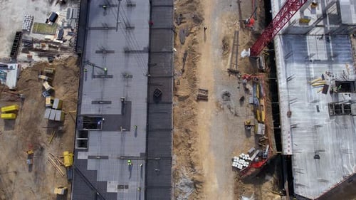 Workers On The Building Construction Site Aerial