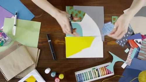 Hands of Woman Making Paper Collage