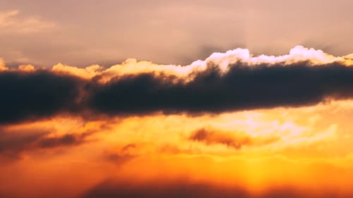 Sunset Cloudy Sky With Fluffy Clouds